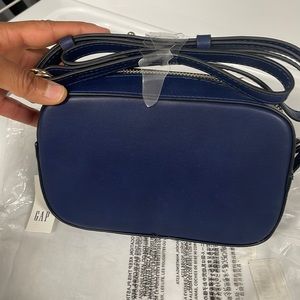 Mini camera bag. Dark blue. From Gap. Brand new with tags. Decent size.